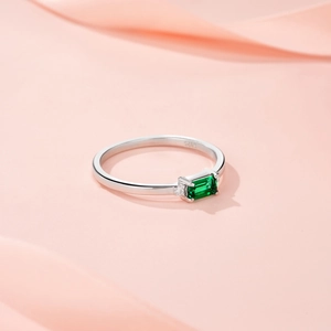 S925 sterling silver ring with octagon emerald cut green gemstone and side diamonds