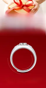 Detail of men's wide band S925 silver ring featuring a round moissanite and side stones