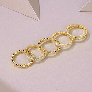 Elegant set of six S925 sterling silver gold plated rings with sparkling moissanite stones