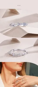 Détail macro de bague en argent S925 avec pierres rondes et marquises alternées