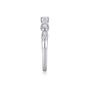 Detail view of S925 silver ring featuring round moissanite in circular and marquise settings