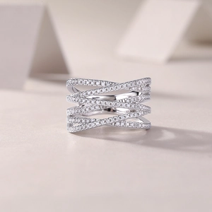 Detailed view of layered criss-cross S925 sterling silver ring with micro-pave moissanite