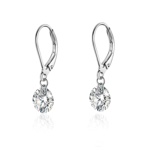 Macro detail of silver lever-back earrings with round brilliant-cut moissanite stones
