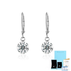 Detail of Moissanite sterling silver earrings with GRA certificate and blue gift box