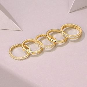 Set of five S925 sterling silver gold plated rings with moissanite pave setting