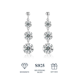 Detail of S925 sterling silver moissanite earrings with three-stone graduated design and gift box