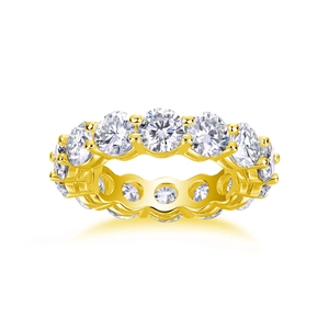 Close-up of eternity ring with 5mm round moissanite stones set in gold plated silver
