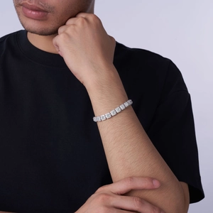 Mens square cut moissanite S925 sterling silver tennis bracelet on male model wrist