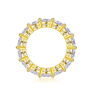 Macro shot of 5mm D color moissanite eternity band in gold-plated S925 sterling silver