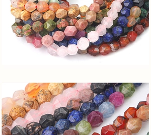 Macro shot of multi-color faceted natural stone beads including rose quartz and agate