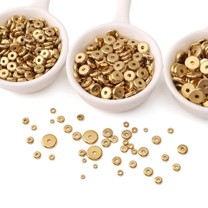 Flat golden stainless steel spacer beads in various sizes for DIY jewelry making