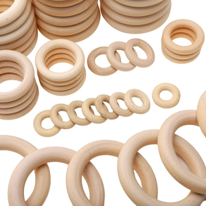 Natural unfinished wooden rings in various sizes for DIY crafts and jewelry making