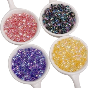 Polished iridescent oval glass beads in pastel pink, purple, blue and yellow for DIY jewelry