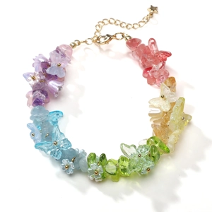 Colorful glass butterfly and flower bead bracelet with gold chain and lobster clasp