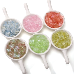 Detailed view of translucent butterfly beads for DIY jewelry making in six vibrant colors