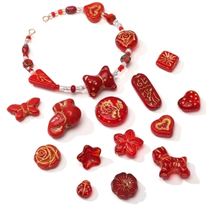 Handcrafted red glass Czech beads set with gold accents for DIY jewelry making