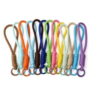 Assorted thirteen-color braided polyester paracord keychains with matching metal O-rings