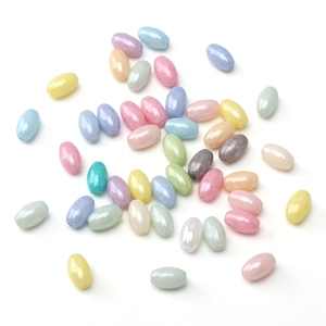 Mix of colorful 4x7mm oval macaron glass beads with smooth pearlescent finish for DIY