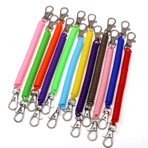 Close-up of flexible colorful plastic coil keychains with silver metal lobster clasps