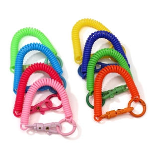 Detail of colorful retractable plastic spring keychain coils with snap hooks for DIY crafts