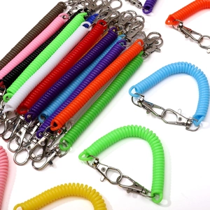 Colorful plastic spring spiral keychain with zinc alloy lobster clasps on white background