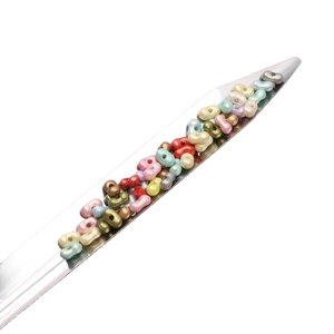 Colorful bow-knot beads with metallic luster for DIY jewelry making in a silver tray
