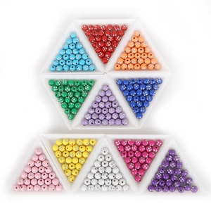 Assorted 8mm colorful acrylic rhinestone beads arranged in sorting trays for DIY jewelry