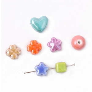 Colorful glazed ceramic beads in heart, flower and star shapes for DIY jewelry making