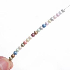Assorted 4mm glass pearl beads in various colors for DIY jewelry making and crafts