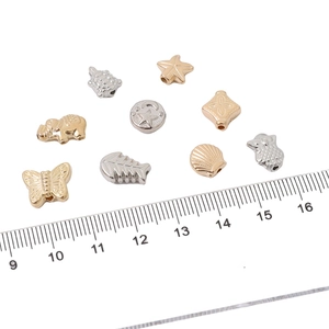 Assorted DIY animal charm beads including turtles and owls for jewelry making