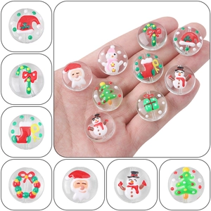 Detail of Christmas themed glass beads featuring Santa Snowman and trees for DIY jewelry