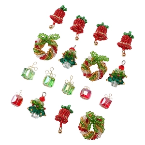 DIY Christmas glass charms set featuring festive bells, wreaths, trees and gift boxes
