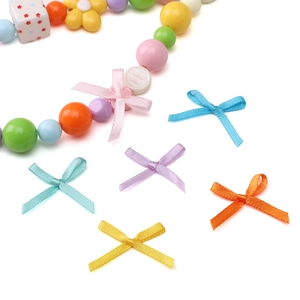Set of colorful mini polyester ribbon bows for DIY jewelry and crafts in five vibrant colors