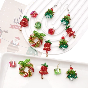 Handmade DIY Christmas jewelry kit with glass beads, trees, wreaths and bells
