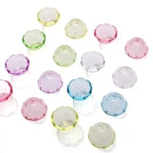 Detailed macro view of colorful translucent lily-shaped acrylic beads for DIY jewelry