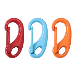 Close-up of three colorful alloy lobster clasps in red blue and orange for DIY jewelry