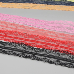 Detailed macro view of colorful floral polyester lace ribbons for DIY handmade accessories
