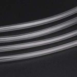 Macro shot of flexible transparent heat shrink tubing showing material thickness and texture