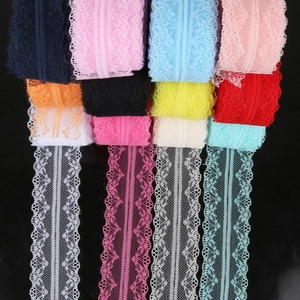 Assorted colorful polyester lace ribbon rolls for DIY crafts and garment sewing decorations