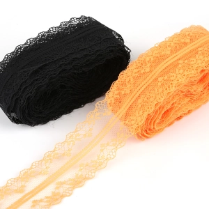Polyester lace trim ribbon with floral mesh patterns in black and orange colors