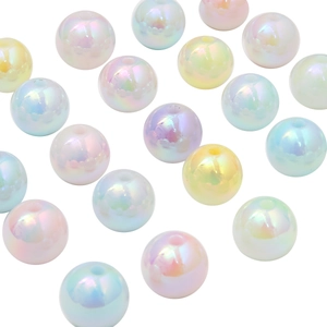 Macro shot of 16mm iridescent acrylic round beads with rainbow finish for DIY jewelry