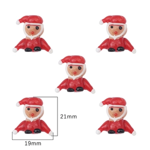 Detail showing five 21mm Santa Claus resin charms for DIY Christmas jewelry making