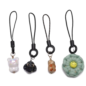 Minimalist DIY charm set with black lanyard including resin bear and woven flower charms