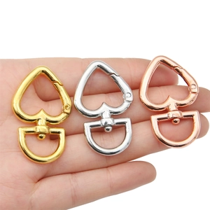 Heart-shaped alloy keychains in gold, silver, and rose gold with swivel d-ring attachment