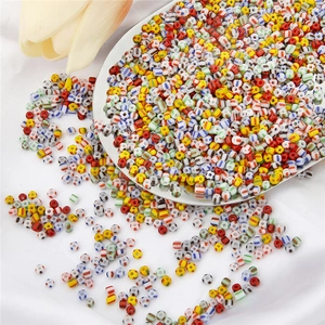 Macro shot of colorful striped glass seed beads for DIY bracelet making and jewelry design