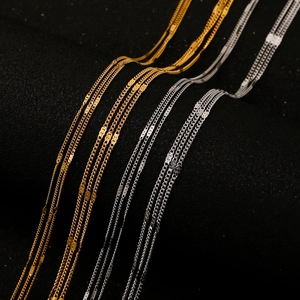 Three-layer 18K gold and silver stainless steel choker necklaces with sequins on black surface