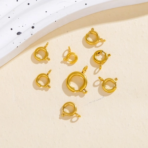 Macro detail of 18K gold plated stainless steel spring ring clasps in various sizes