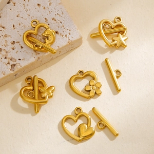 Goldene Herz-OT-Verschlüsse mit Delfin- und Sternanhängern für DIY-Schmuckherstellung