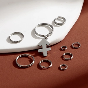 Polished stainless steel double rings with Sagittarius arrow pendant in multiple sizes