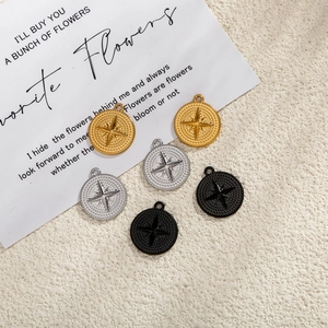 Polished stainless steel octagram compass pendants in gold, silver, and black finishes